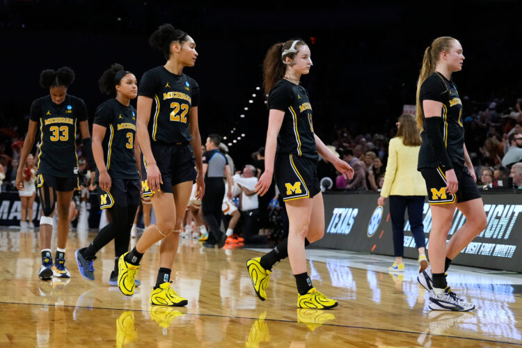 Misfiring Michigan wilts under Texas defense's pressure in 77-41 Elite Eight loss